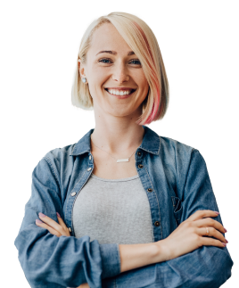 Young woman smiling at camera with her arms crossed.