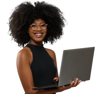 Woman smiling, wearing business casual, holding a laptop.