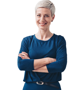 Woman smiling in business casual with her arms crossed.