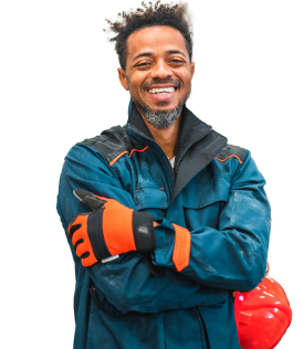 Man in construction uniform smiling at camera.